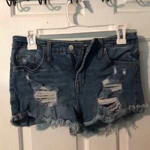 Distressed denim shorts